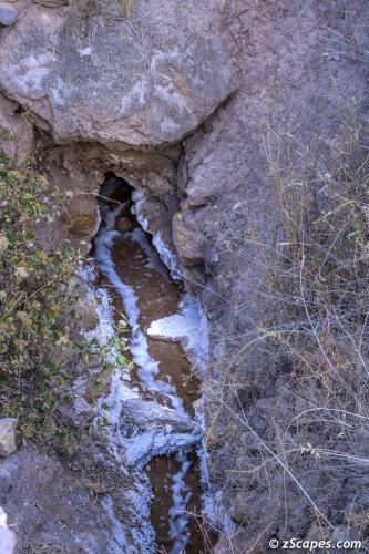 Maras salt pond source emerging from the bedrock