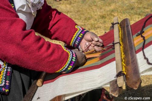 Close in of the intricate manipulation of the wools to create elborate patterns