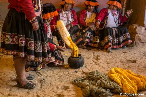 Orange dye creation as the artist look on and keep spinning 